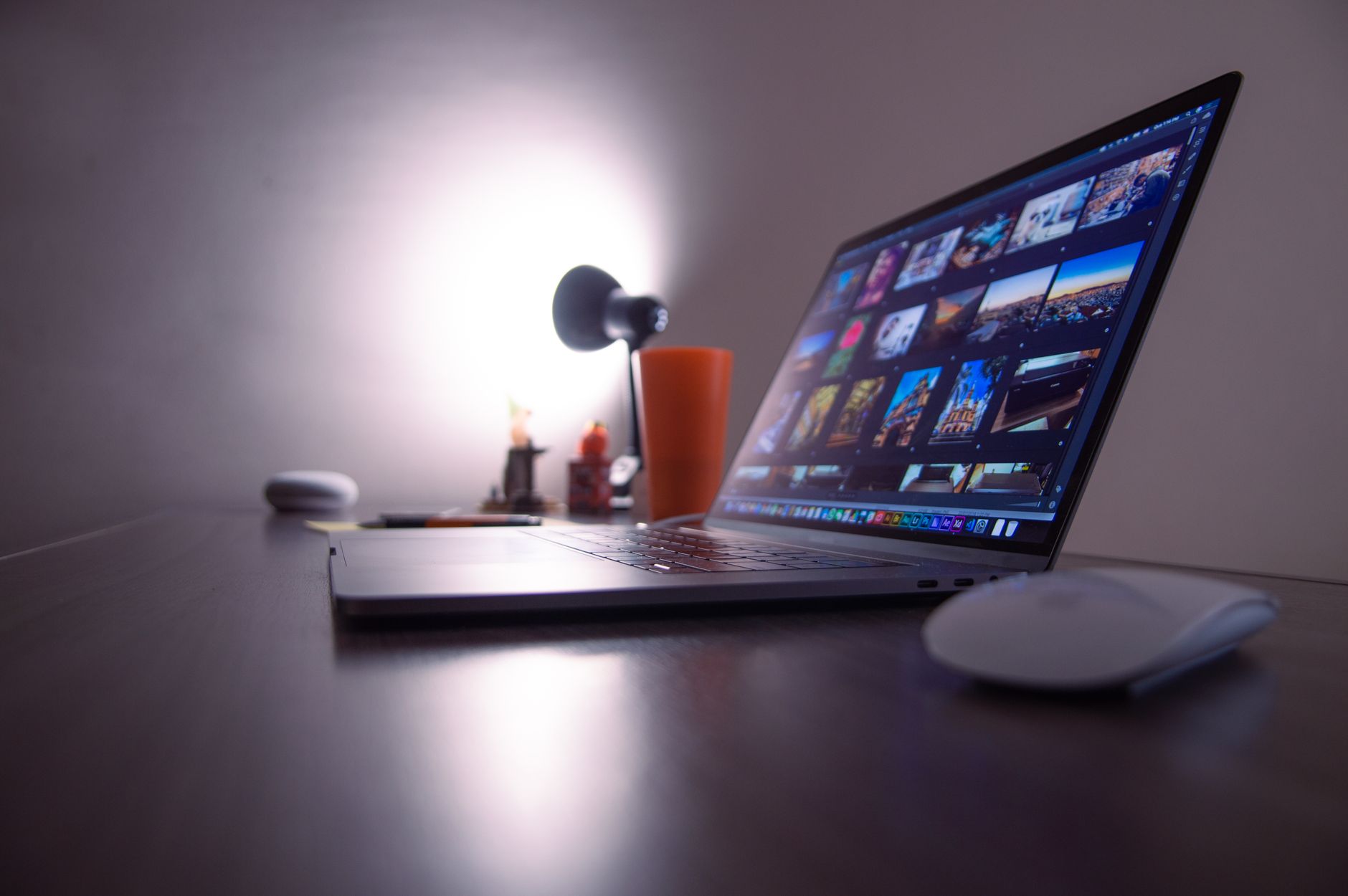 An organized desk with folders and a laptop representing a service repackaged into a repeatable template