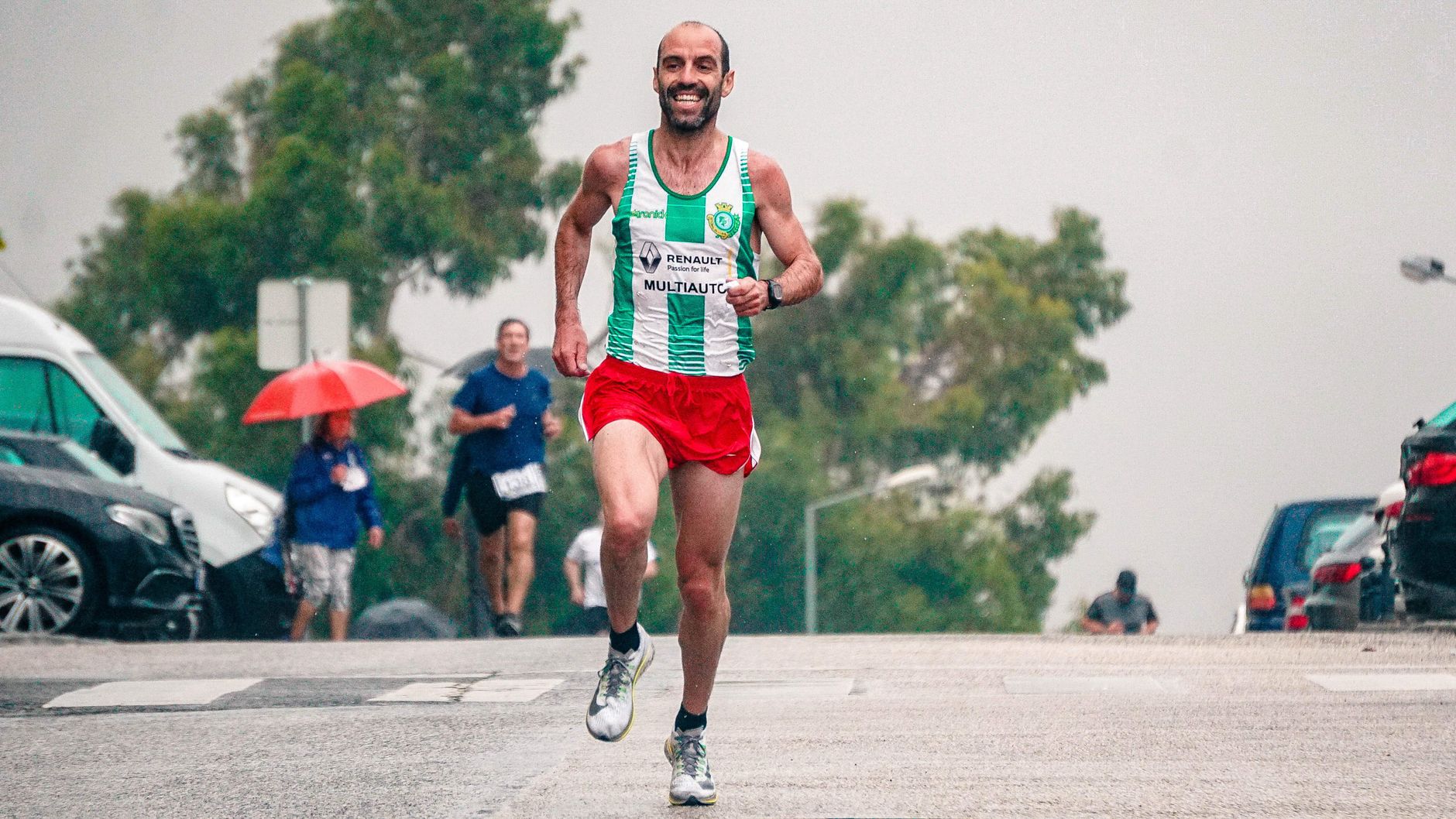 A runner continuing through a difficult stretch instead of performing confidence for an audience